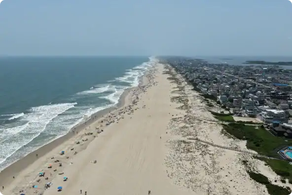 A calm beach scene near ShoreBreak Recovery.