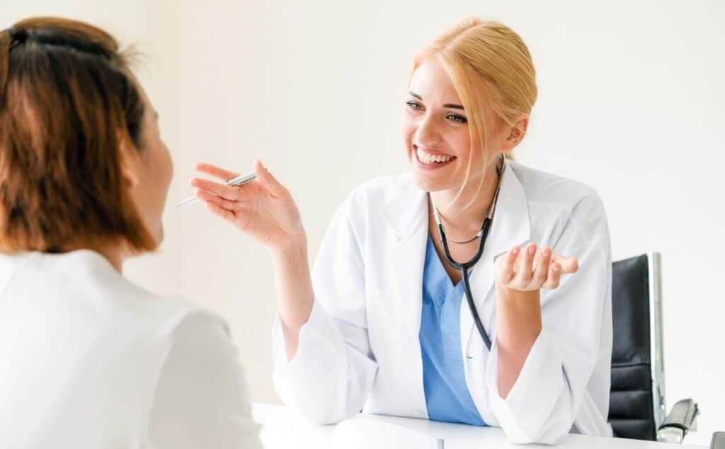 Doctor guiding a client through South Jersey co-occurring disorder treatment.