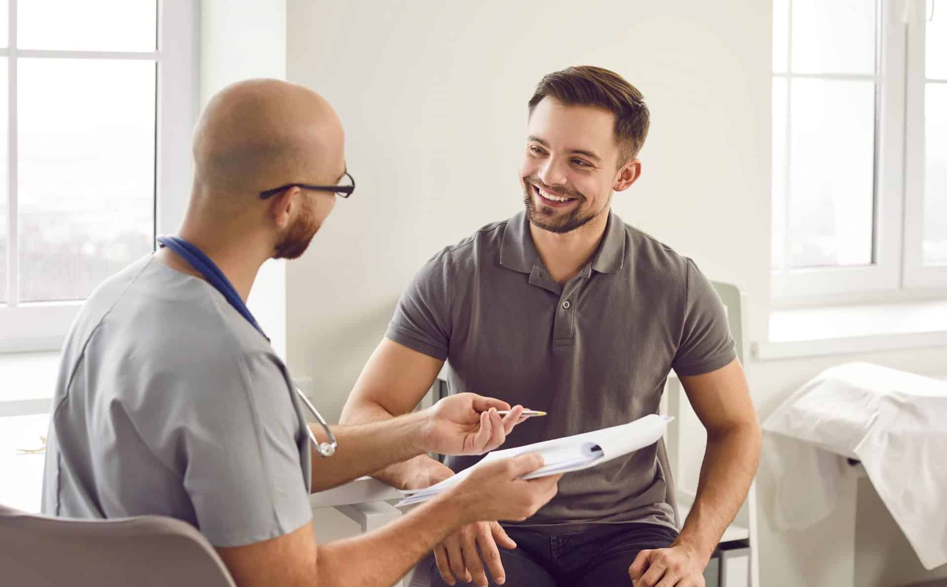 Man receiving guidance from a doctor during South Jersey co-occurring disorder treatment.