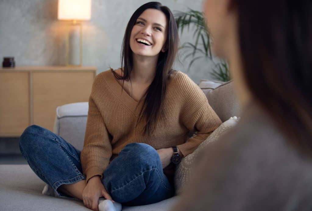 A woman enjoys aftercare services after completing our south jersey partial care program