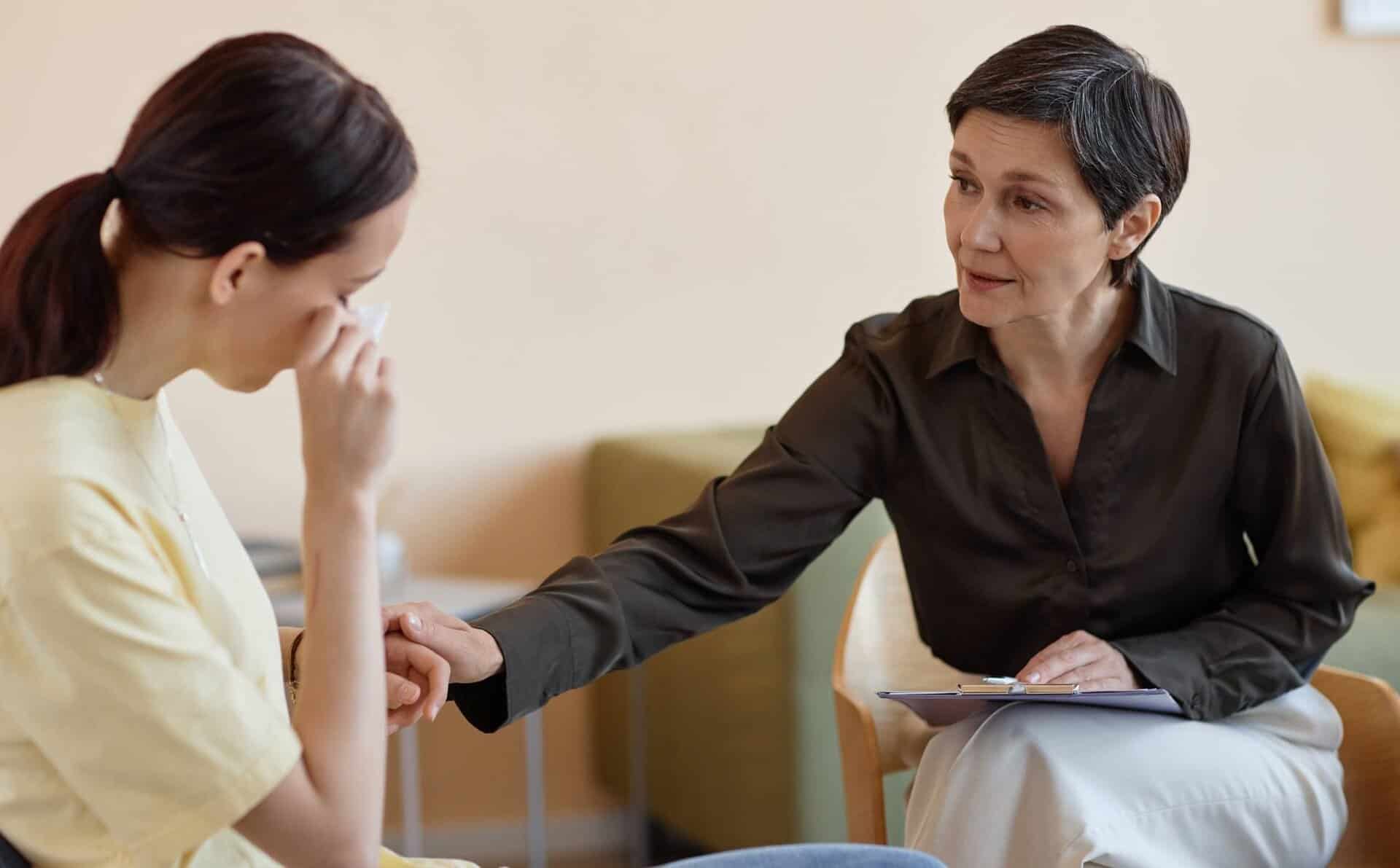 Therapist offering emotional support during South Jersey trauma informed care.