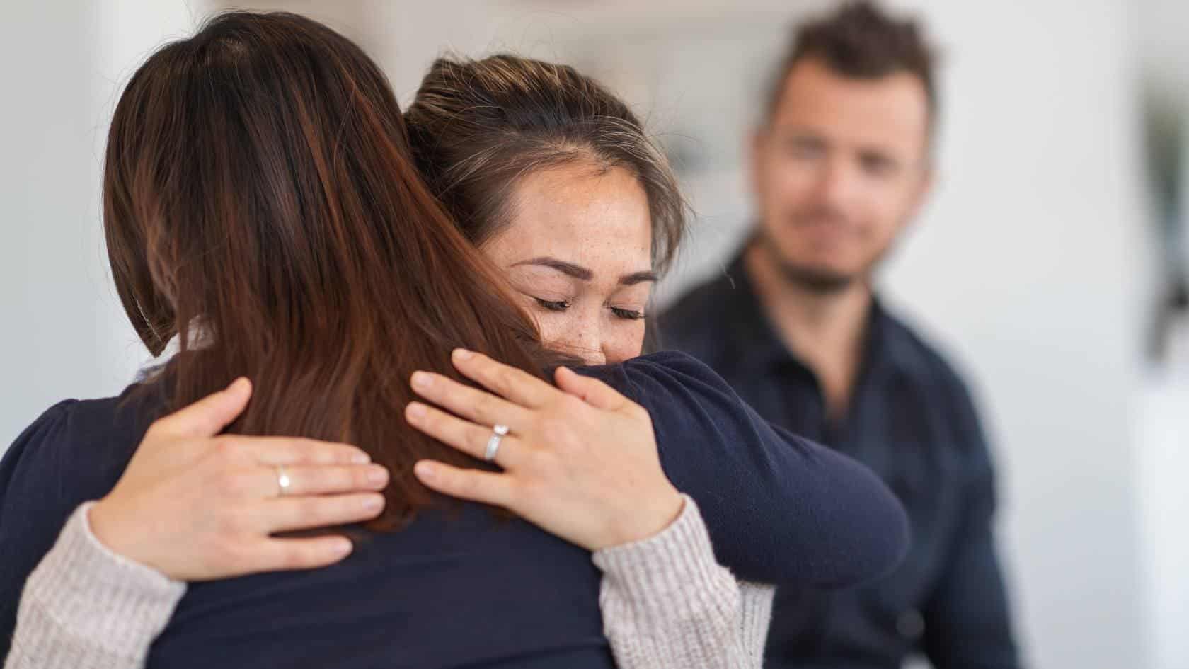 Woman reconnecting with a loved one during South Jersey opioid addiction treatment.
