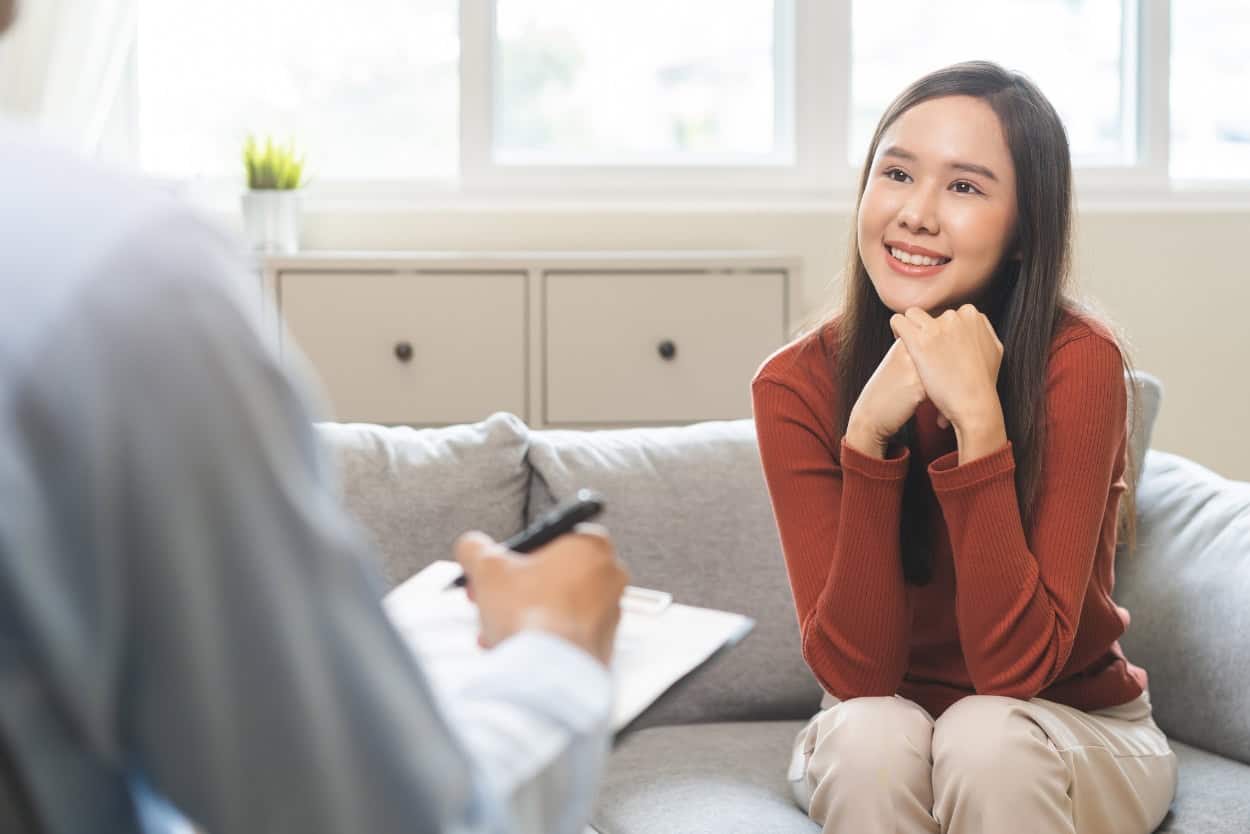 A woman gets help finding personalized recovery resources through South Jersey case management.