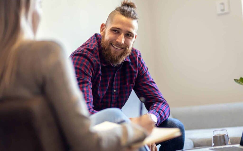 Man feeling hopeful in recovery through South Jersey carfentanil addiction treatment.