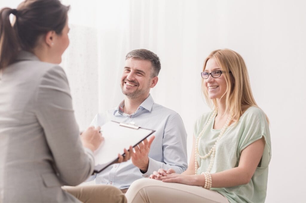 A couple discusses options for insurance during rehab in Linwood, NJ.