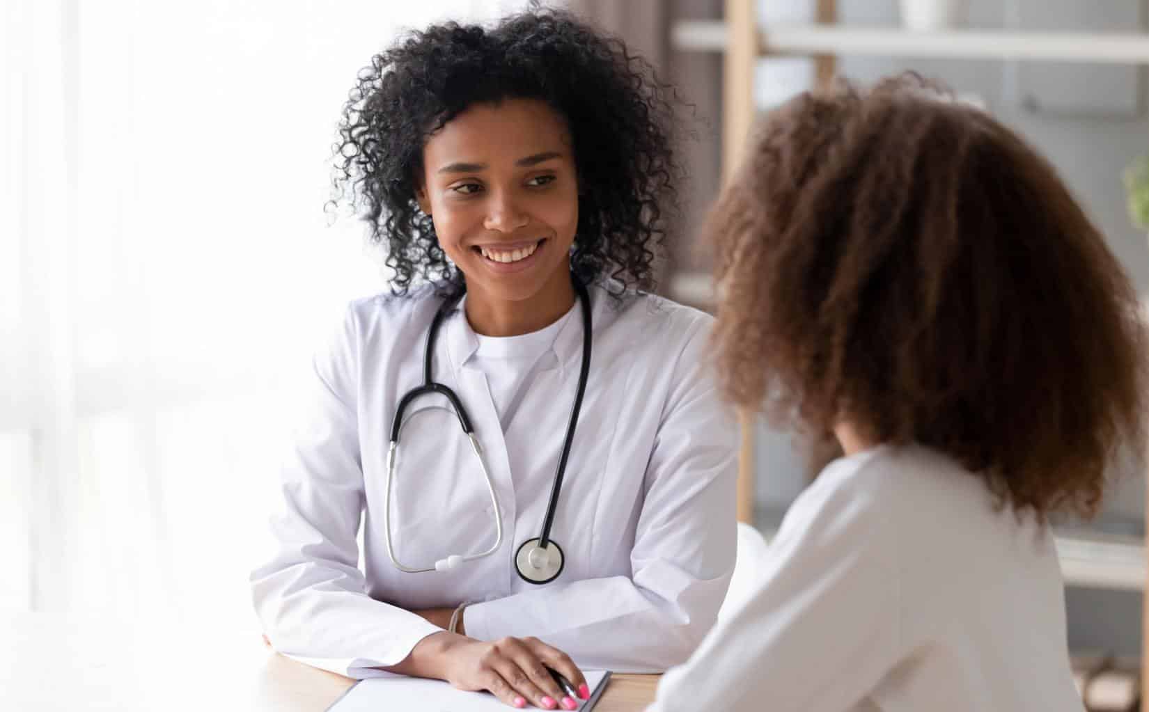 Doctor checking in with a client during treatment at an Aetna rehab in New Jersey.