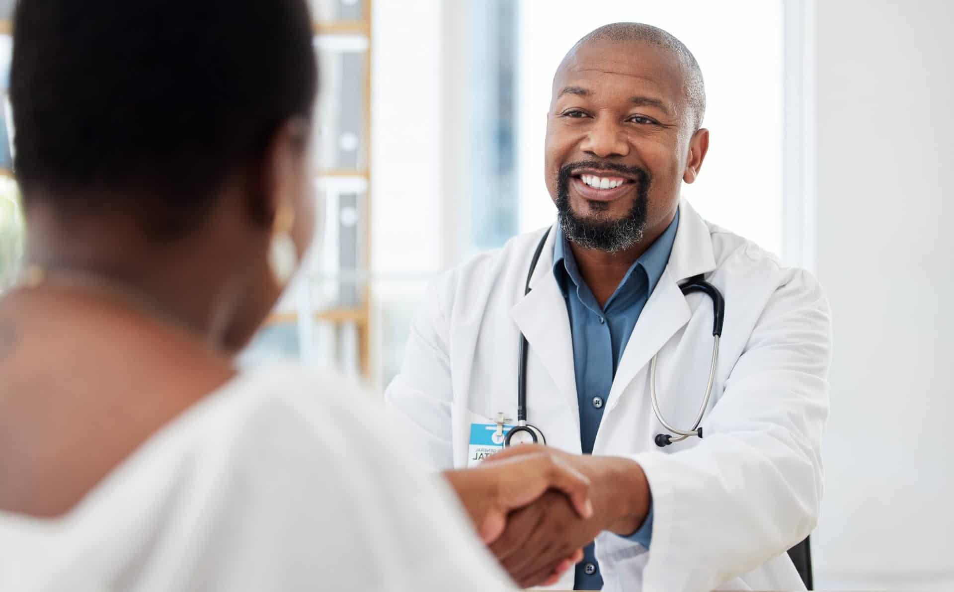 Warm greeting between doctor and patient at a Humana rehab in New Jersey.