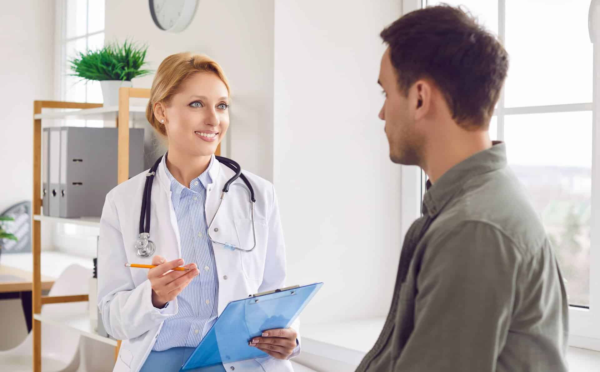 Physician meeting with a client during South Jersey valium addiction treatment.