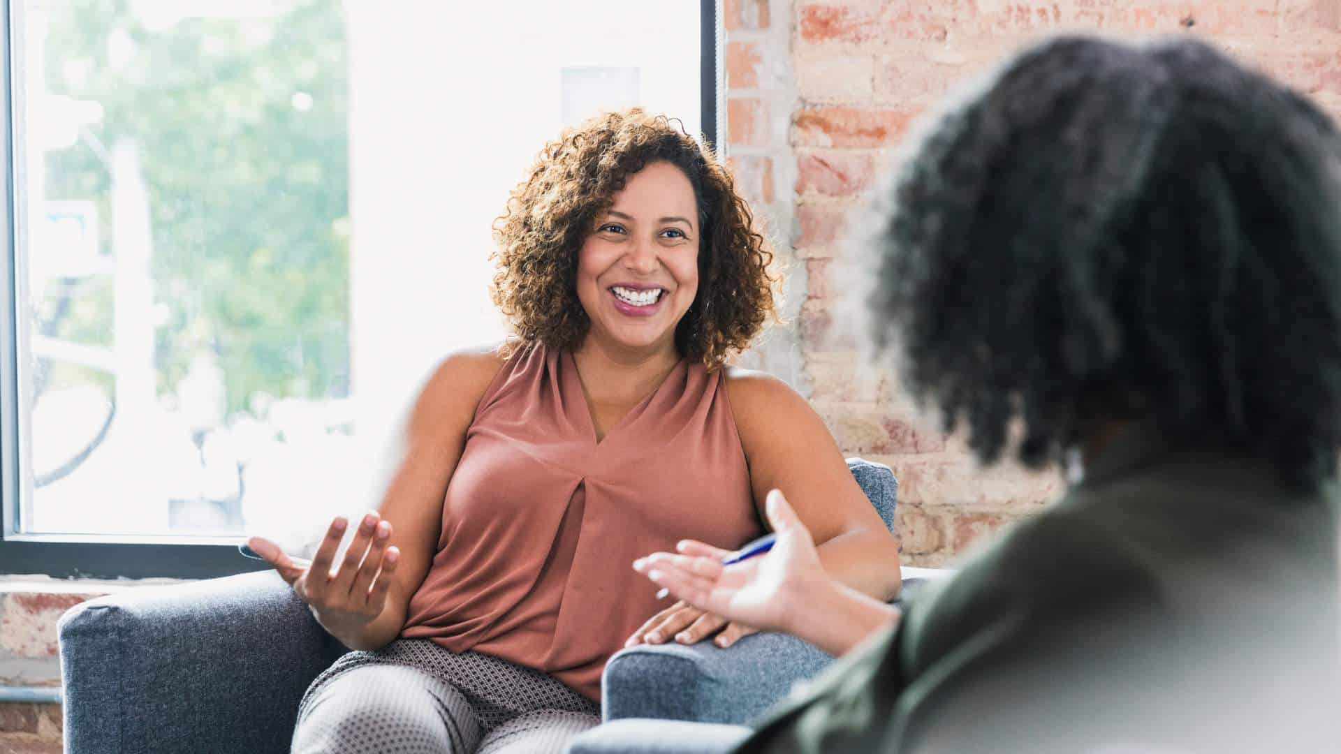 A woman speaking with a therapist during an individual therapy session at a drug rehab near Galloway Township, NJ