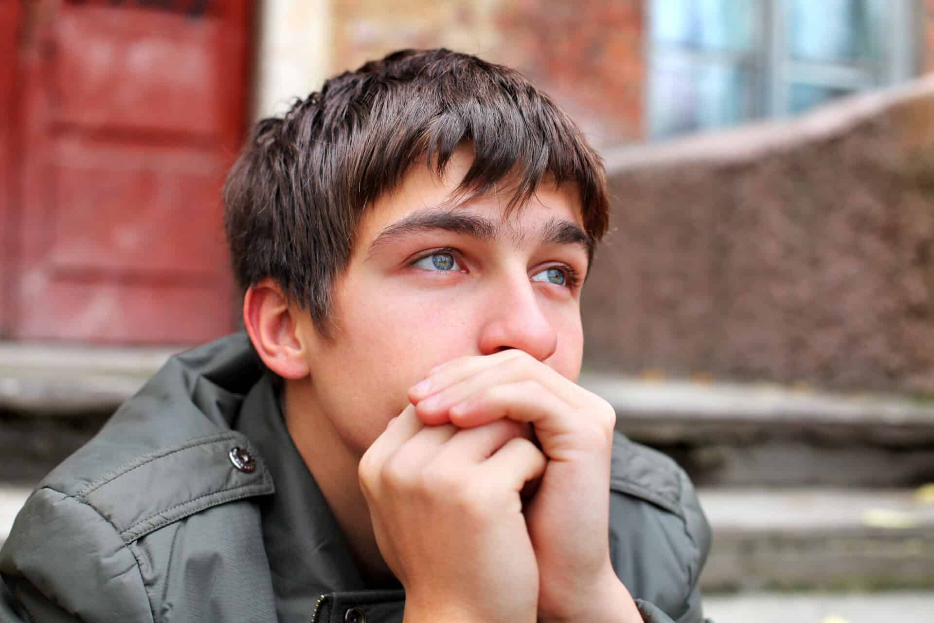 Thoughtful man reflecting on the question, "Do I need rehab?"