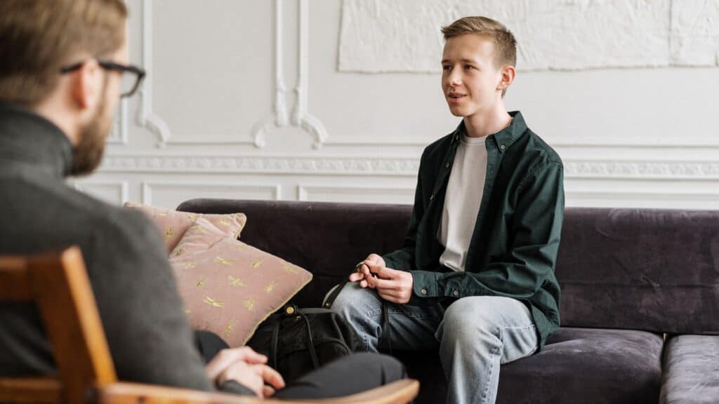 Man talking to a counsellor in search for answer to the question Do I need rehab